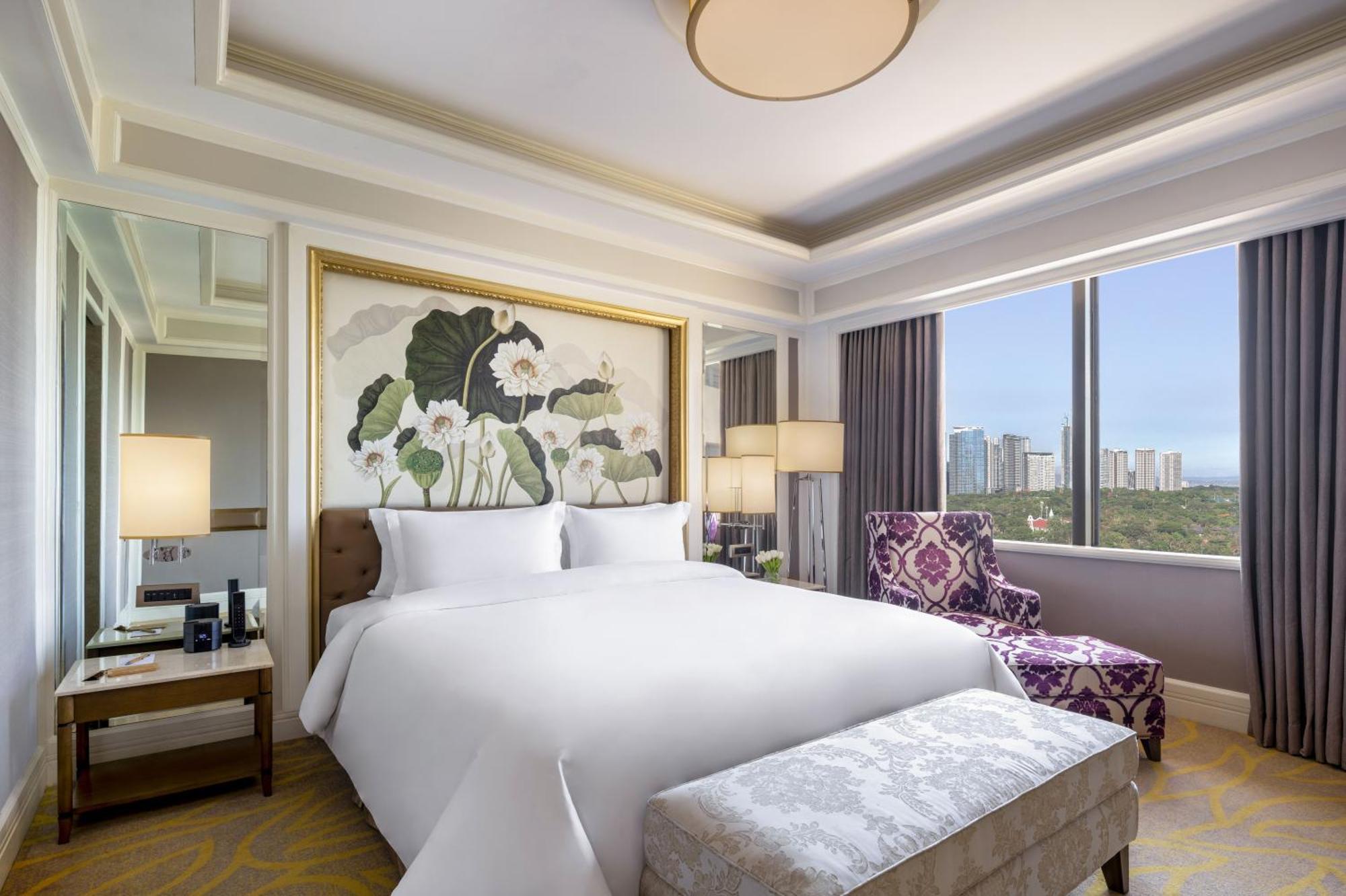 Dusit Thani Manila San Pedro Makati Quarto foto A bedroom at the hotel
