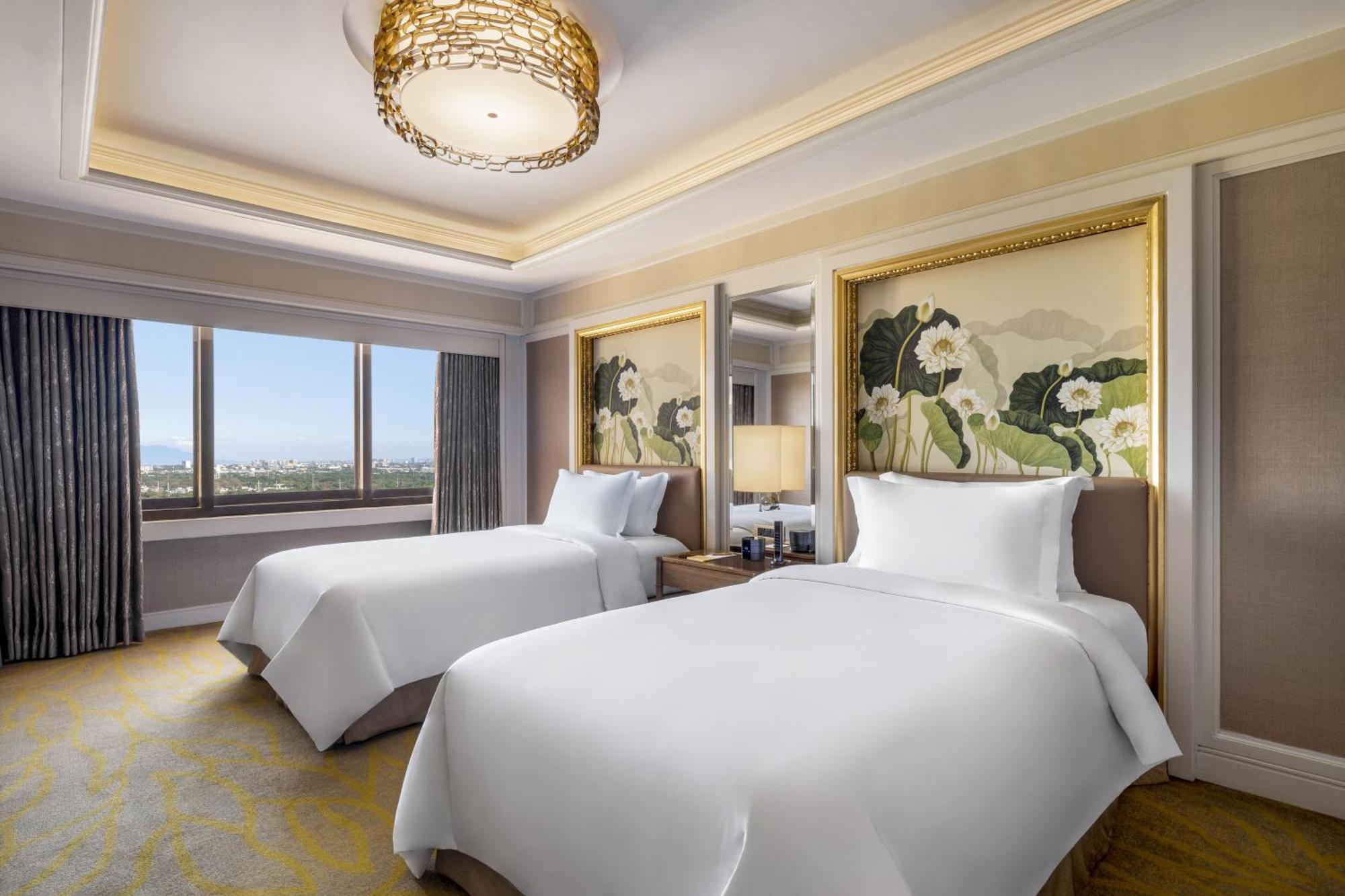 Dusit Thani Manila San Pedro Makati Quarto foto Deluxe Twin