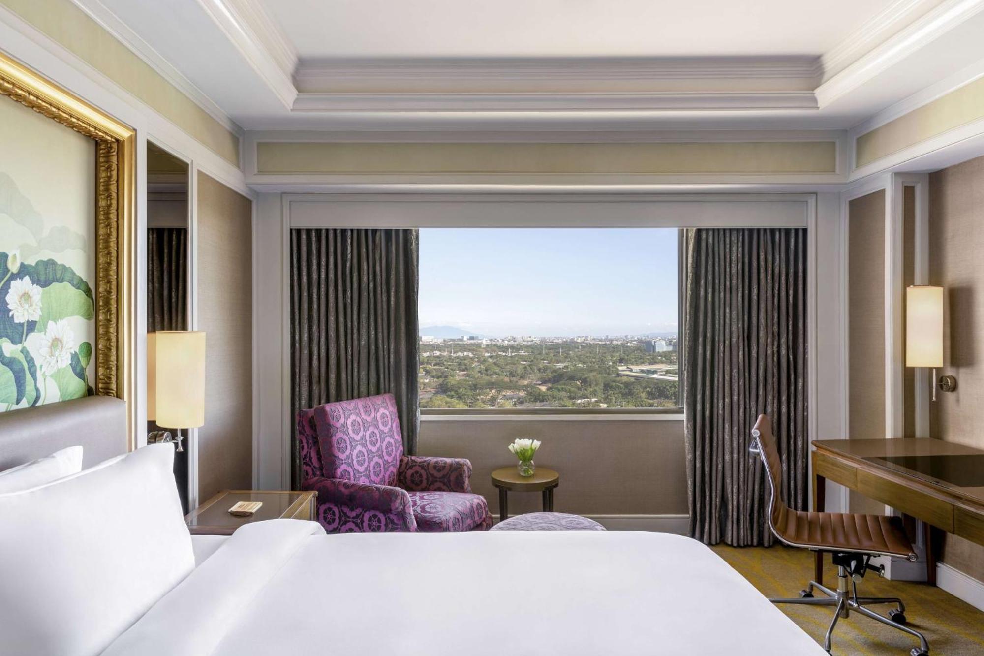 Dusit Thani Manila San Pedro Makati Exterior foto A guest room at the hotel