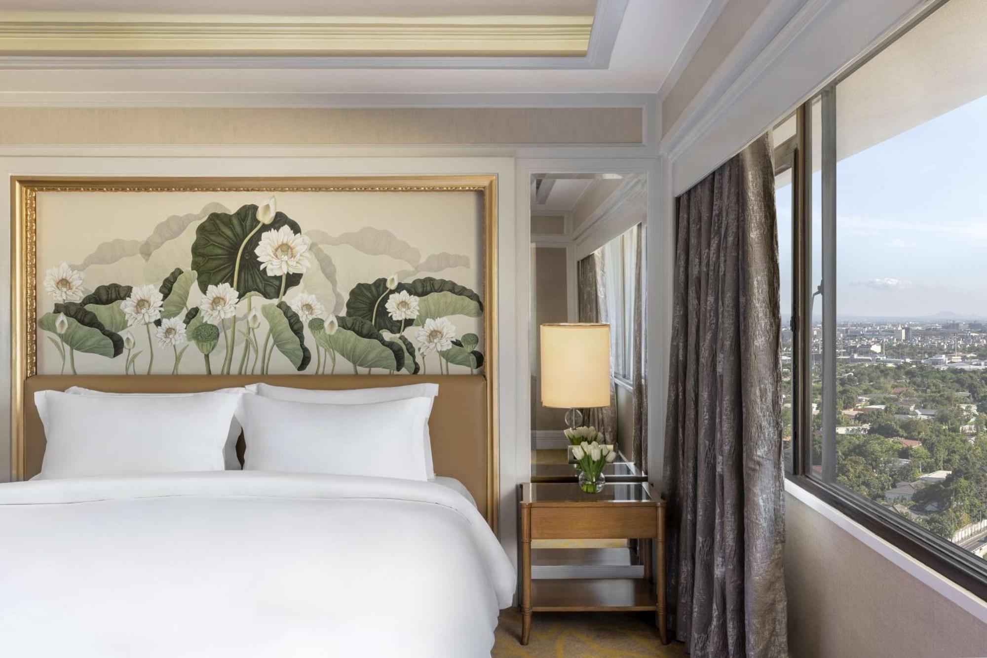 Dusit Thani Manila San Pedro Makati Exterior foto A bedroom at the hotel